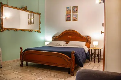 Letto o letti in una camera di B&B Epoche'
