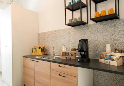 Cucina o angolo cottura di MIGLIO SACRO Suites