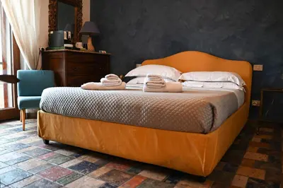 Letto o letti in una camera di B&B Casamiranapoli