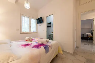 Letto o letti in una camera di La Favola di San Martino