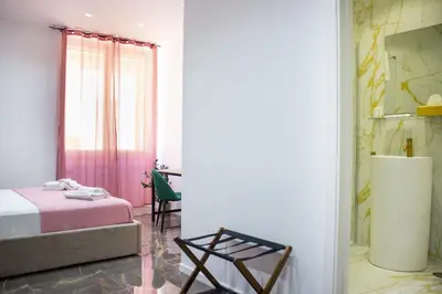 Letto o letti in una camera di Residenza Angioina