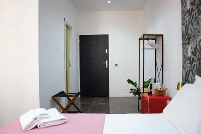 Letto o letti in una camera di Residenza Angioina