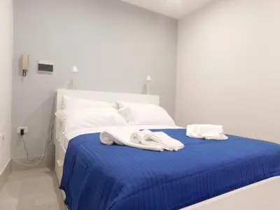 Letto o letti in una camera di Ricas Home