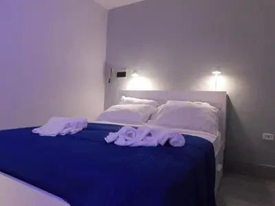 Letto o letti in una camera di Ricas Home