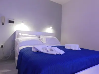 Letto o letti in una camera di Ricas Home