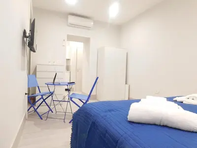 Letto o letti in una camera di Ricas Home