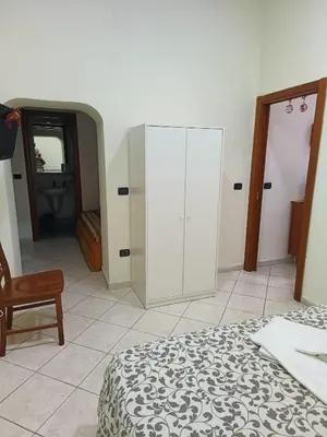 Letto o letti in una camera di Gabriella House Napoli