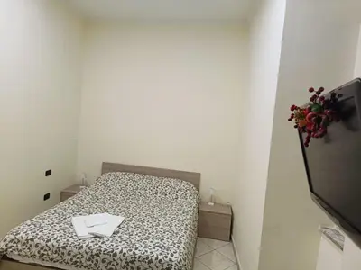 Letto o letti in una camera di Gabriella House Napoli