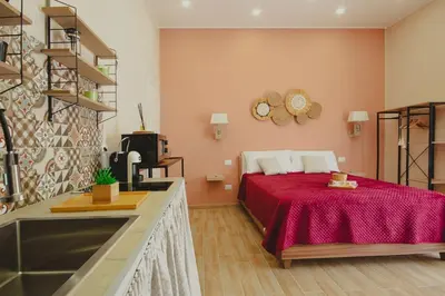 Letto o letti in una camera di Marie home experience 1 deluxe