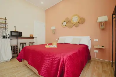 Letto o letti in una camera di Marie home experience 1 deluxe