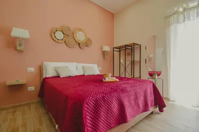 Letto o letti in una camera di Marie home experience 1 deluxe