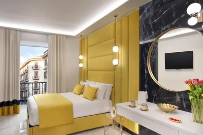 Letto o letti in una camera di Incanto Suites Italy