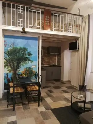TV o dispositivi per l'intrattenimento presso Casina San Gregorio Apartment