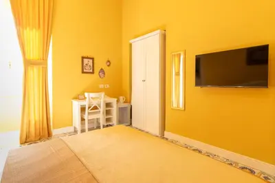 TV o dispositivi per l'intrattenimento presso Guesthouse Adry in Naples