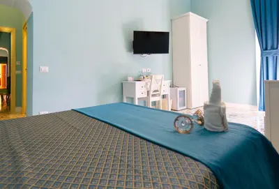 Letto o letti in una camera di Guesthouse Adry in Naples