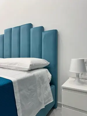 Letto o letti in una camera di Posty's Suite