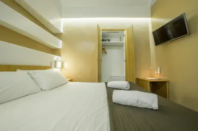 Letto o letti in una camera di Chiaia 197 Deluxe Residence