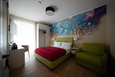Letto o letti in una camera di Via Toledo 156 Napoli Cozy Rooms