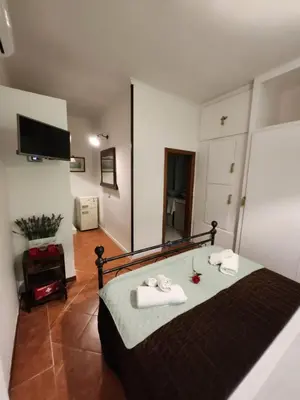 Letto o letti in una camera di La Nobildonna locazione breve