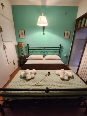 Letto o letti in una camera di La Nobildonna locazione breve