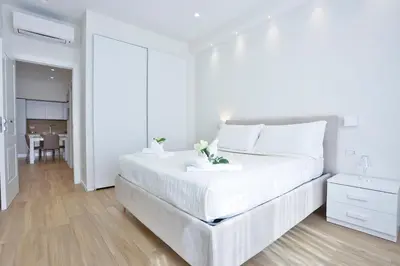 Letto o letti in una camera di GuestHost - Style Vomero House & Suite