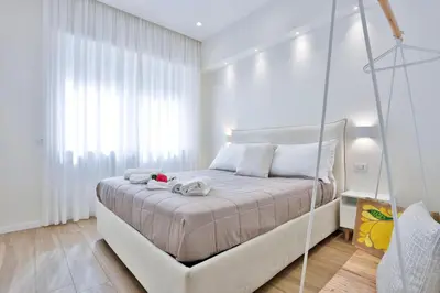Letto o letti in una camera di GuestHost - Style Vomero House & Suite