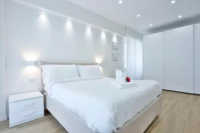 Letto o letti in una camera di GuestHost - Style Vomero House & Suite