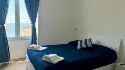 Letto o letti in una camera di Izz Home