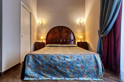 Letto o letti in una camera di Decumani Hotel De Charme