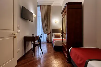 Letto o letti in una camera di Decumani Hotel De Charme