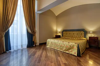 Letto o letti in una camera di Decumani Hotel De Charme