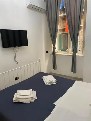 Letto o letti in una camera di Vecchia Napoli Purgatorio