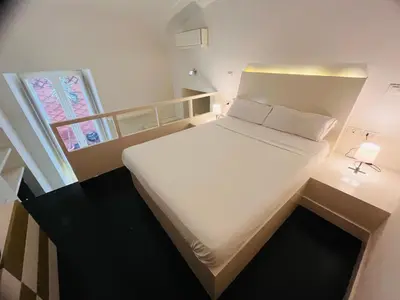 Letto o letti in una camera di Parthenope Plebiscito