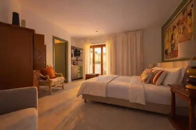 Letto o letti in una camera di Molo Angioino Suites