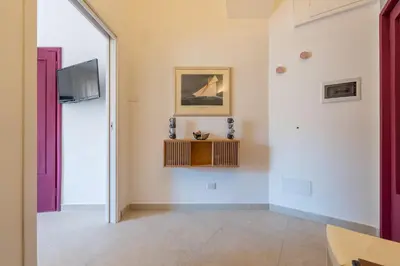 TV o dispositivi per l'intrattenimento presso Molo Angioino Suites