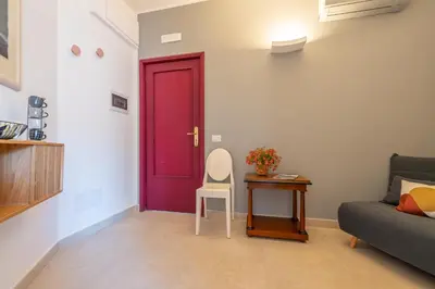 Area soggiorno di Molo Angioino Suites