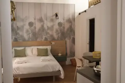 Letto o letti in una camera di La Gioia di Napoli apartment & studios