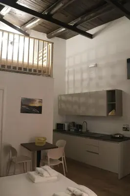 Cucina o angolo cottura di La Gioia di Napoli apartment & studios