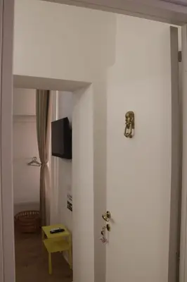 TV o dispositivi per l'intrattenimento presso La Gioia di Napoli apartment & studios
