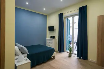 Letto o letti in una camera di Casa MAGICOLATA