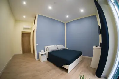 Letto o letti in una camera di Casa MAGICOLATA