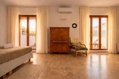 Letto o letti in una camera di Molo Angioino Suites