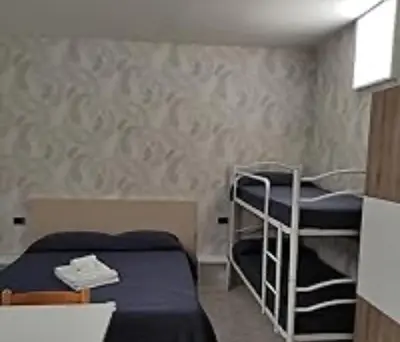 Letto o letti in una camera di Caratteristica home