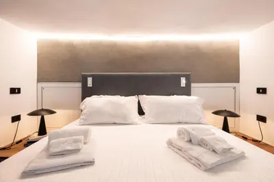 Letto o letti in una camera di Aquaviva Suite Verde