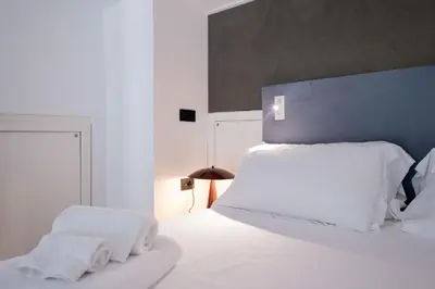 Letto o letti in una camera di Aquaviva Suite Blu