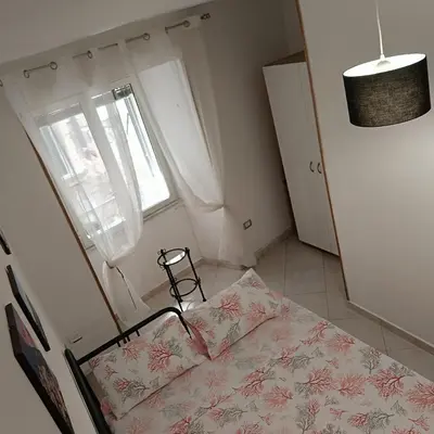 Letto o letti in una camera di Basso Home a Spaccanapoli