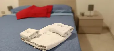 Letto o letti in una camera di Basso Home a Spaccanapoli