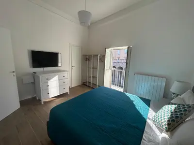 Letto o letti in una camera di Santa Chiara View
