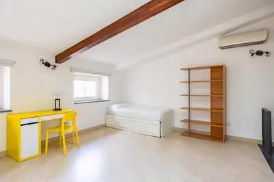 Letto o letti in una camera di Residenza Diaz by Wonderful Italy
