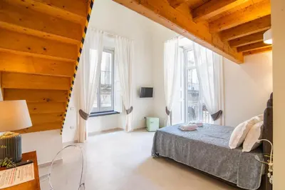 Letto o letti in una camera di Obelisco di San Gennaro